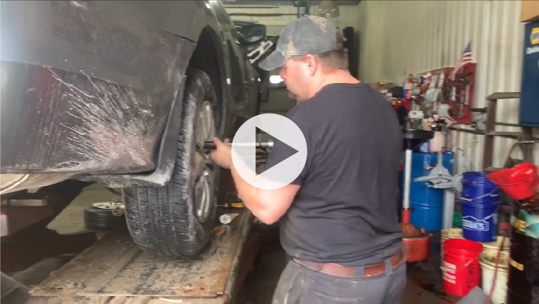 CORE participant working as a mechanic