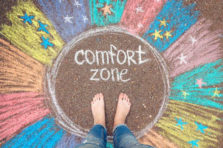 person standing in empty circle labeled comfort zone with colors all around the circle.jpg